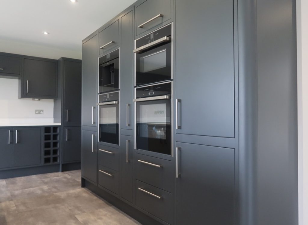 In frame Painted Kitchen with flat style doors